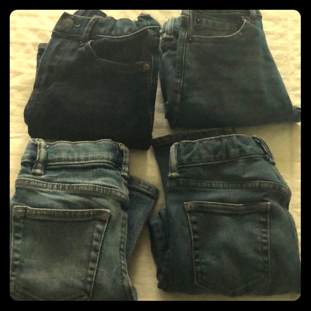 Four pairs of size 6 reg skinny Gap jeans for boys